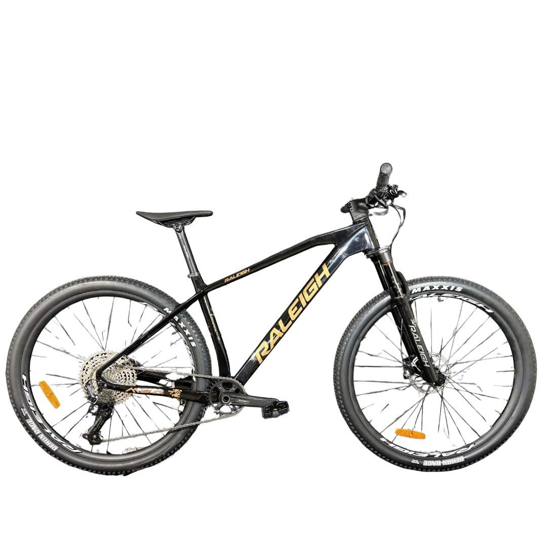 bicicleta-raleigh-80-r29-158-negro-con-dorado